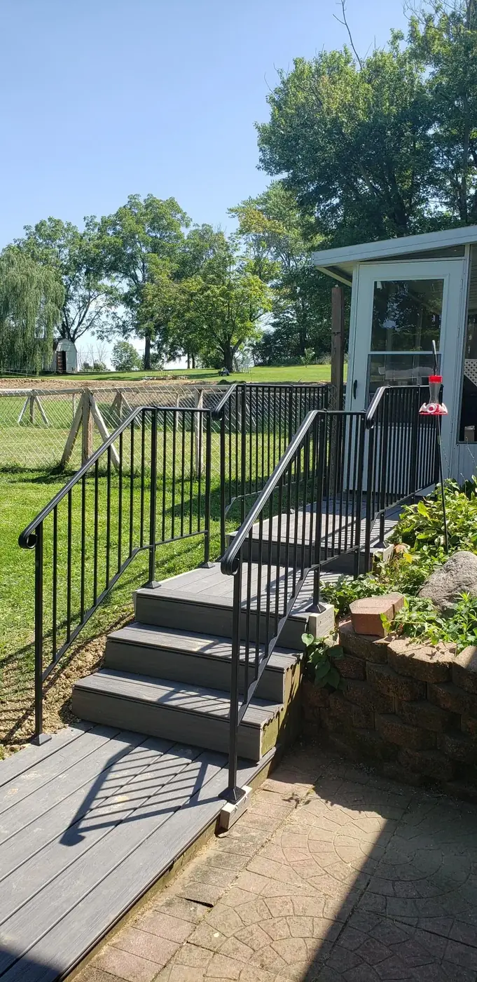 Black wrought iron stair railing installed on a home in Butler County, Ohio