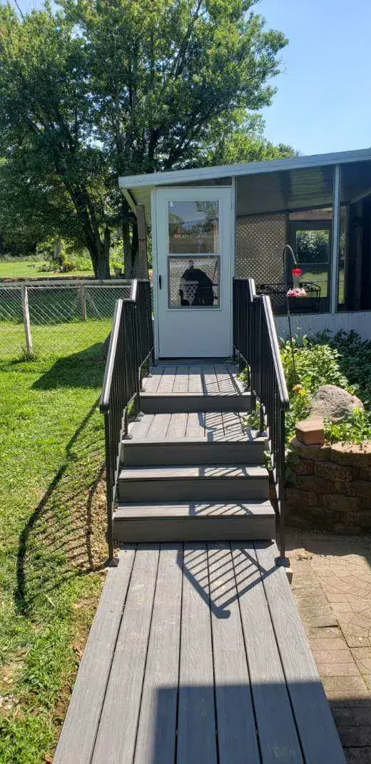 Porch stair railing fabricated and installed by B&B Welding and Repair